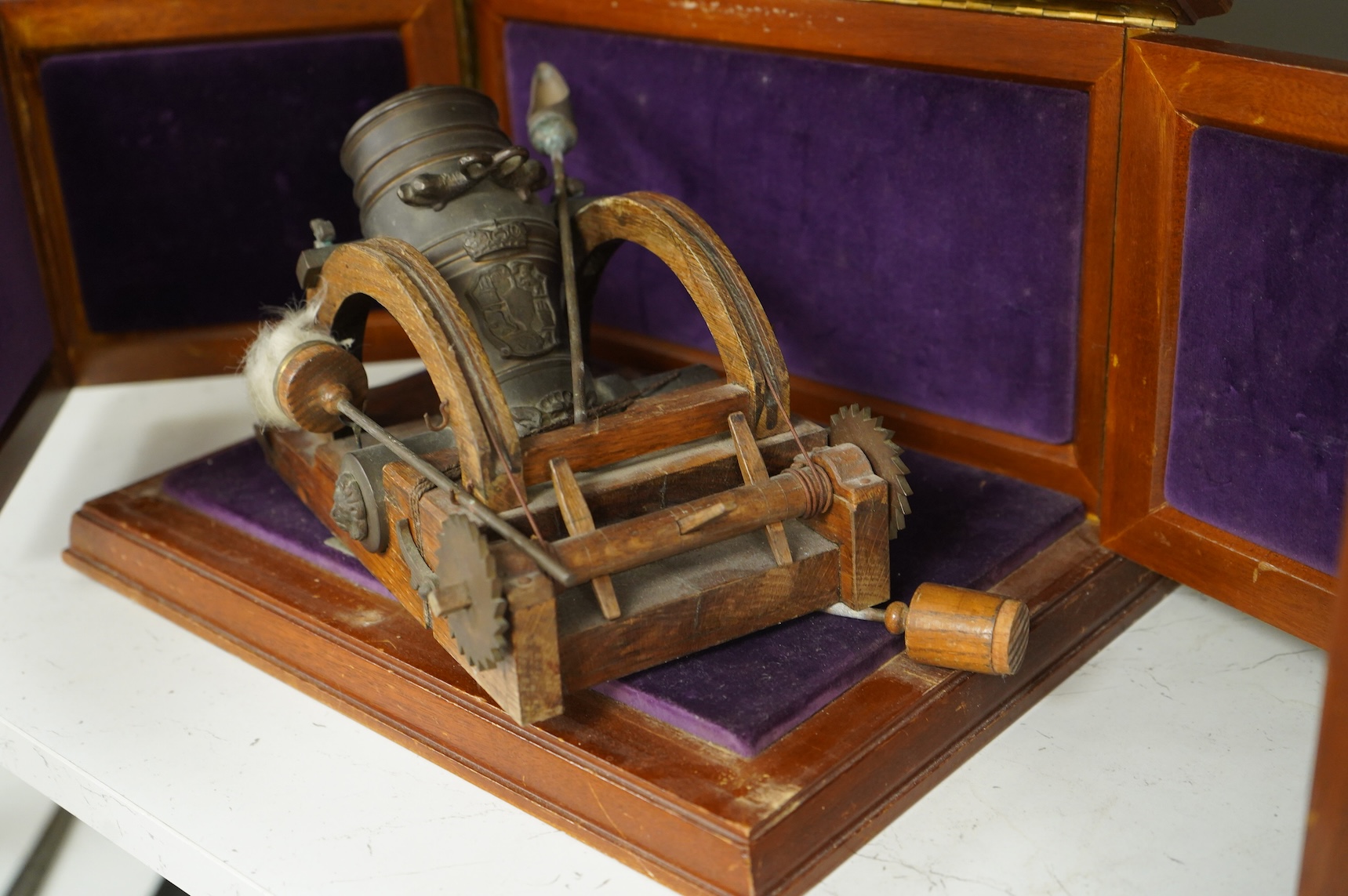 A teak cased presentation model of a bombarda mortar cannon in an oak frame, presented to Admiral Sir Michael Pollock from the Chief of Staff of the Italian Navy, with applied plaque to the lid engraved; ‘To Admiral Sir